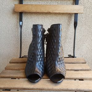 BCBGeneration Sexy Black 4 inch open toed heels.